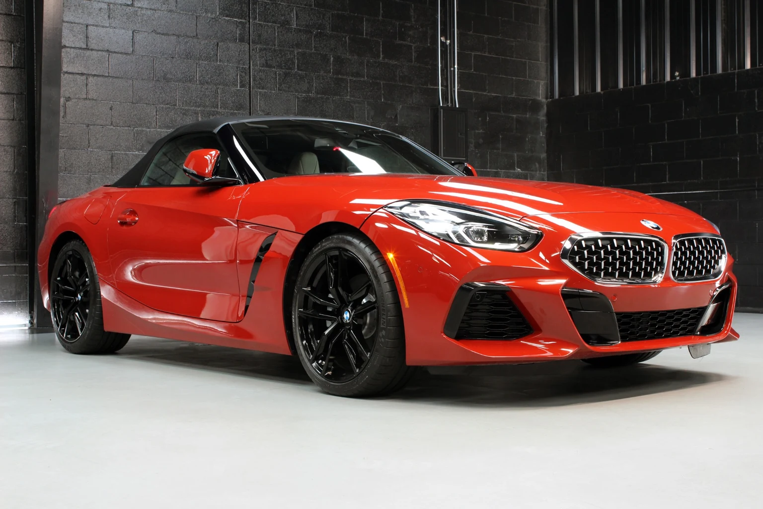 BMW Z4 Red Cabriolet model reference; current rental-unit photographs available on request
